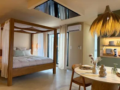 Un ou plusieurs lits dans un hébergement de l'établissement Baldamour Cocon romantique et spa Proche Caen