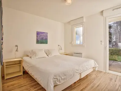 Un ou plusieurs lits dans un hébergement de l'établissement Appartement 2 chambres avec double terrasse à Merville-Franceville-Plage - FR-1-788-96
