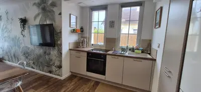 Cuisine ou kitchenette dans l'établissement L'Espadon