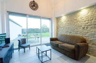 Coin salon dans l'établissement Gîte du Cellier - Jardin et terrasse