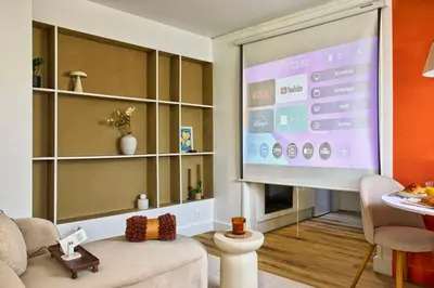 Coin salon dans l'établissement Le Chéron - Confort, Wi-Fi & commerces à deux pas