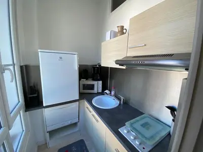 Cuisine ou kitchenette dans l'établissement Studio lumineux Cabourg plage & commerces à pied