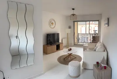 Télévision ou salle de divertissement dans l'établissement Agréable appartement au cœur de Cabourg