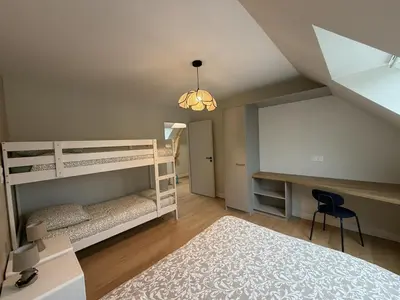 Un ou plusieurs lits dans un hébergement de l'établissement Villa Saint michel 220m2