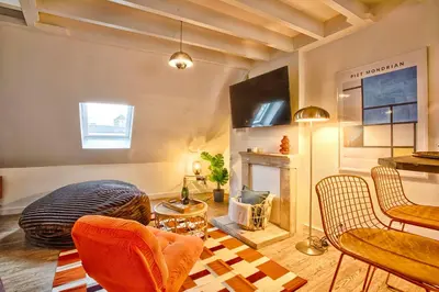 Télévision ou salle de divertissement dans l'établissement La Cime - Duplex hypercentre, Wi-Fi & restaurant