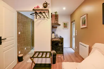 Coin salon dans l'établissement Le 1 du Clos Fleuri - Studio avec extérieur privatif