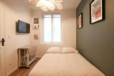 Un ou plusieurs lits dans un hébergement de l'établissement Le 2 du Clos Fleuri - Avec espace extérieur