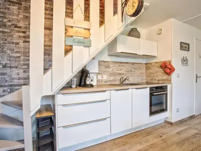 Cuisine ou kitchenette dans l'établissement Duplex cosy en bord de mer avec parking - FR-1-788-98