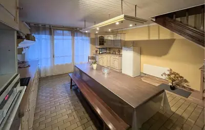 Cuisine ou kitchenette dans l'établissement Gîte Gouvile