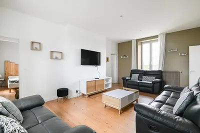 Télévision ou salle de divertissement dans l'établissement Gîte de la Poste - Avec jardin