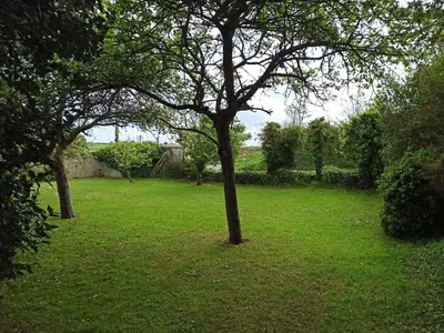 Jardin de l'établissement Maison au cœur des plages du débarquement