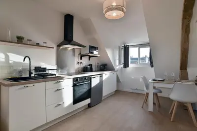 Cuisine ou kitchenette dans l'établissement Les Trois Rois 5 - Centre Avranches