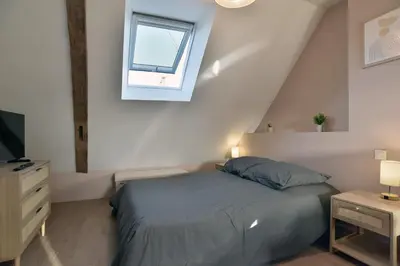 Un ou plusieurs lits dans un hébergement de l'établissement Les Trois Rois 5 - Centre Avranches