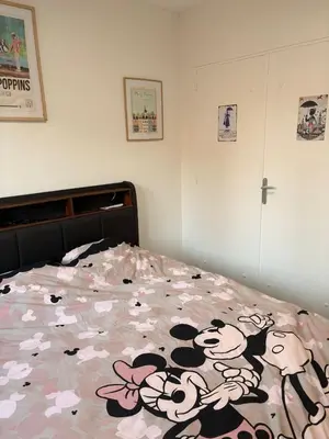 Un ou plusieurs lits dans un hébergement de l'établissement Appartement familial Disney proche de la mer