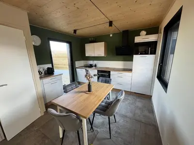 Cuisine ou kitchenette dans l'établissement Lodges des Pontons - Cap Sud - vue mer