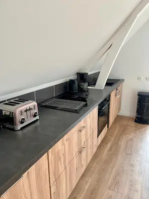 Cuisine ou kitchenette dans l'établissement Calme, moderne, Dives