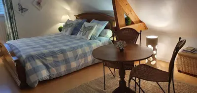 Un ou plusieurs lits dans un hébergement de l'établissement Maison des Hortensias