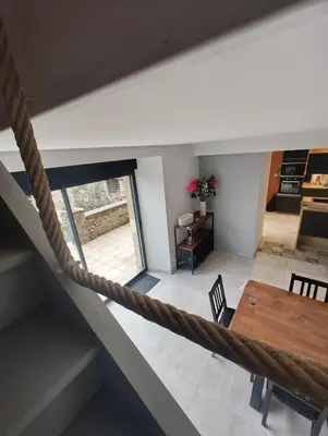 Coin salon dans l'établissement Grande maison de famille au cœur du Cotentin