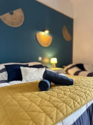 Un ou plusieurs lits dans un hébergement de l'établissement Gîte 5places LE PRE SALE avec jardin proche mont saint michel