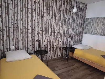 Un ou plusieurs lits dans un hébergement de l'établissement Ô 92 - Maison mitoyenne avec terrasse et parking privé - Saint-Lô centre
