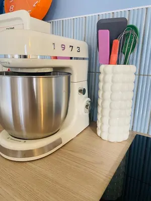 Cuisine ou kitchenette dans l'établissement La Capucine