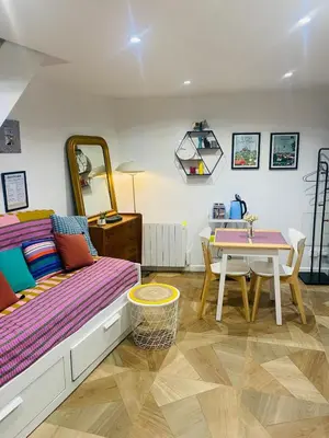 Coin salon dans l'établissement Duplex house with small terrace