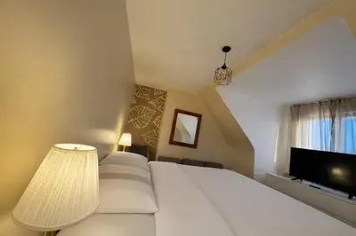 Télévision ou salle de divertissement dans l'établissement Charmante maison moderne et cosy