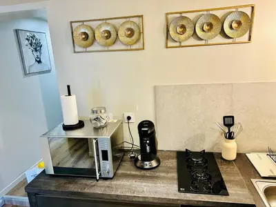 Plateau bouilloire dans l'établissement Appartement moderne et chaleureux
