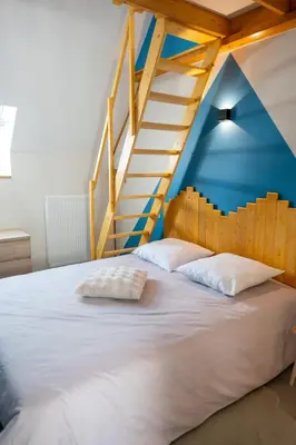 Un ou plusieurs lits dans un hébergement de l'établissement Pont-d'Ouilly - Le Châtaignier
