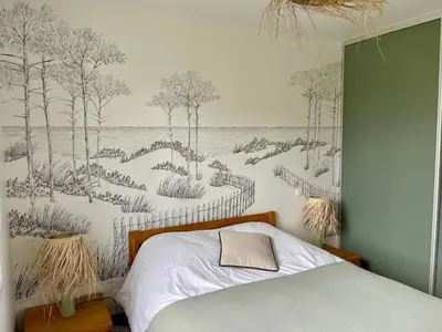 Un ou plusieurs lits dans un hébergement de l'établissement Holiday Home Haus im Erdgeschoss in Strandnähe by Interhome