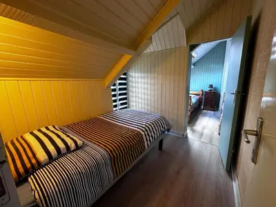 Un ou plusieurs lits dans un hébergement de l'établissement Holiday Home Longère mit Pool by Interhome