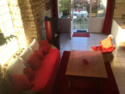 Coin salon dans l'établissement Holiday Home Gemütliches Haus in der Bucht von Mont-Saint-Michel by Interhome