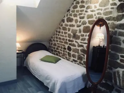 Un ou plusieurs lits dans un hébergement de l'établissement Holiday Home Gemütliches Haus in der Bucht von Mont-Saint-Michel by Interhome