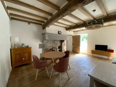 Télévision ou salle de divertissement dans l'établissement Gîte 50 rue de la mer