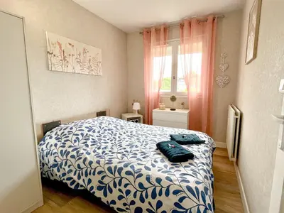 Un ou plusieurs lits dans un hébergement de l'établissement Cabourg bel appartement proche de la plage