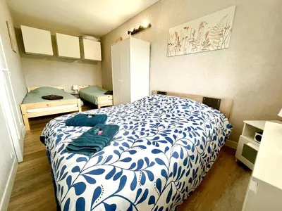Un ou plusieurs lits dans un hébergement de l'établissement Cabourg bel appartement proche de la plage