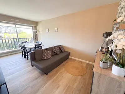 Coin salon dans l'établissement Cabourg bel appartement proche de la plage