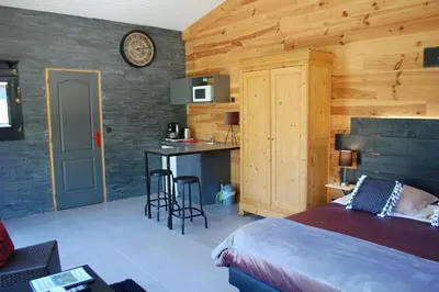 Un ou plusieurs lits dans un hébergement de l'établissement Studio L’Atelier des rêves 2 personnes