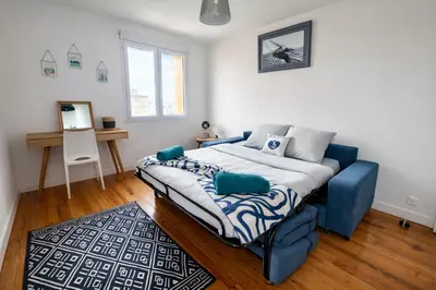 Un ou plusieurs lits dans un hébergement de l'établissement Maison face à la mer avec la Plage à 50 m & Parking privé