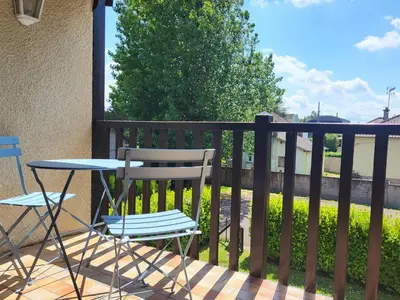 Balcon ou terrasse dans l'établissement Duplex cosy proche plage avec parking privatif - FR-1-788-100