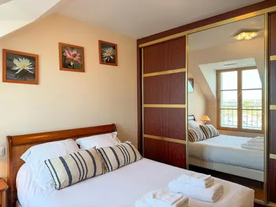 Un ou plusieurs lits dans un hébergement de l'établissement Le Cap -Vue mer & port - Appartement tout confort