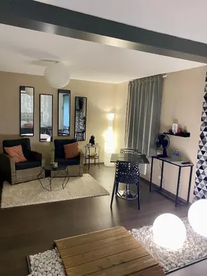 Coin salon dans l'établissement Suite Jacuzzi privatif intérieur 6km du Mont Saint Michel