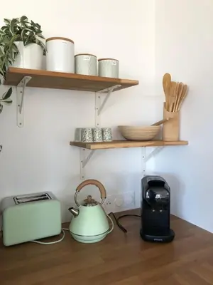 Cuisine ou kitchenette dans l'établissement Appartement Aloha, en plein cœur de Barneville