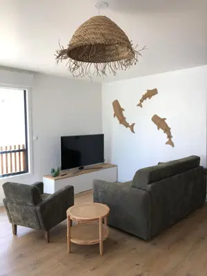 Télévision ou salle de divertissement dans l'établissement Appartement Aloha, en plein cœur de Barneville