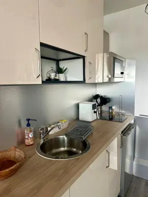 Cuisine ou kitchenette dans l'établissement Le cocon marin