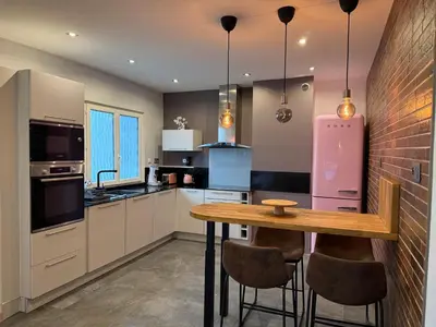 Cuisine ou kitchenette dans l'établissement Maison de rêve