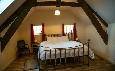 Un ou plusieurs lits dans un hébergement de l'établissement La Ferme du Bois
