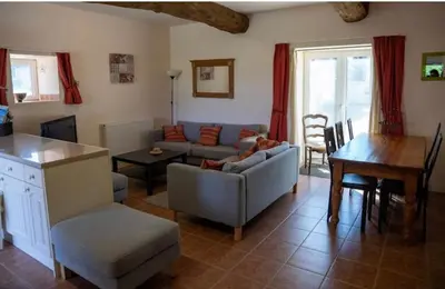 Coin salon dans l'établissement La Ferme du Bois