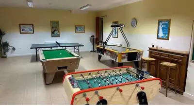 Salle de jeux dans l'établissement La Ferme du Bois