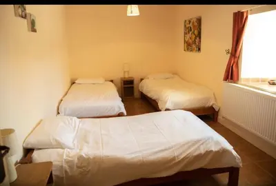 Un ou plusieurs lits dans un hébergement de l'établissement La Ferme du Bois